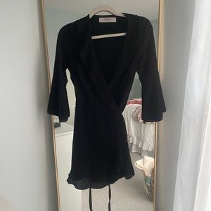 Outrageous brand black wrap dress